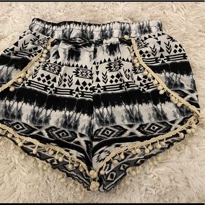Navy/white printed shorts with a crochet trim